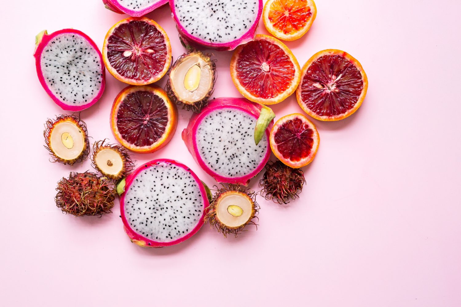 Pink fruits on a pink background.